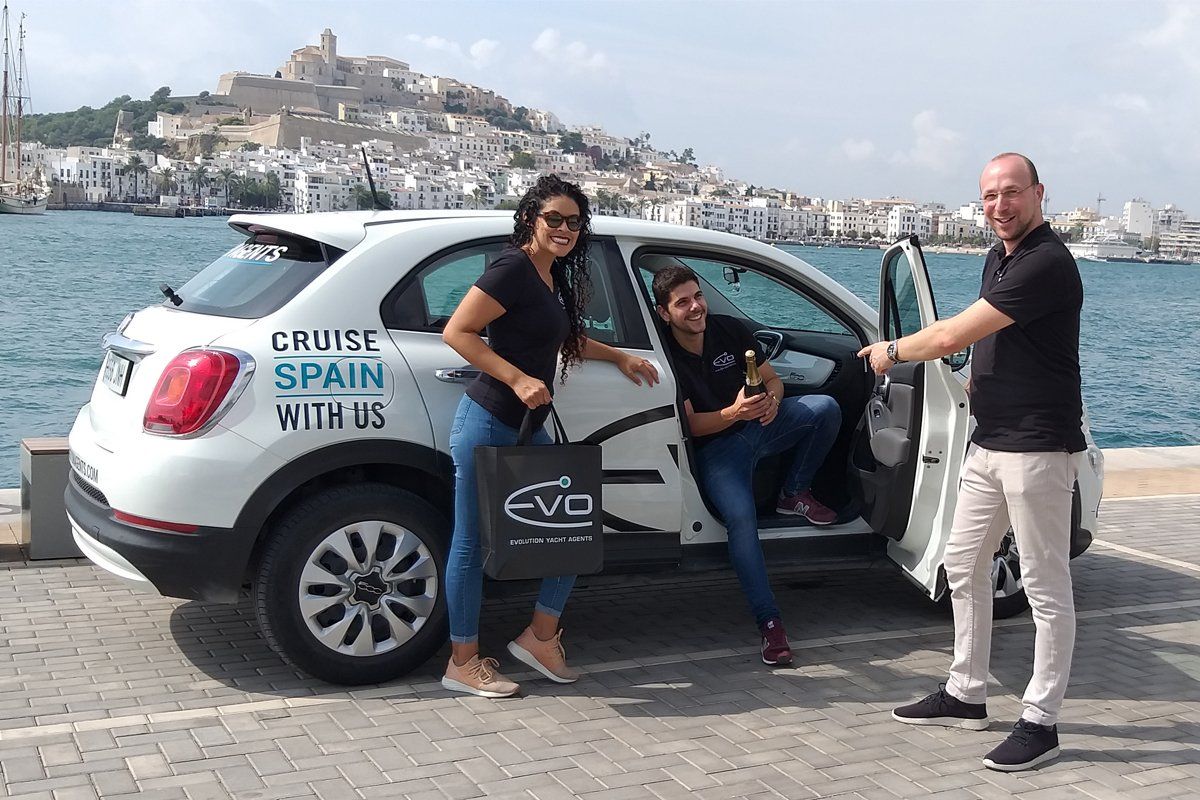 Evolution team in a car overlooking Dalt Vila in Ibiza