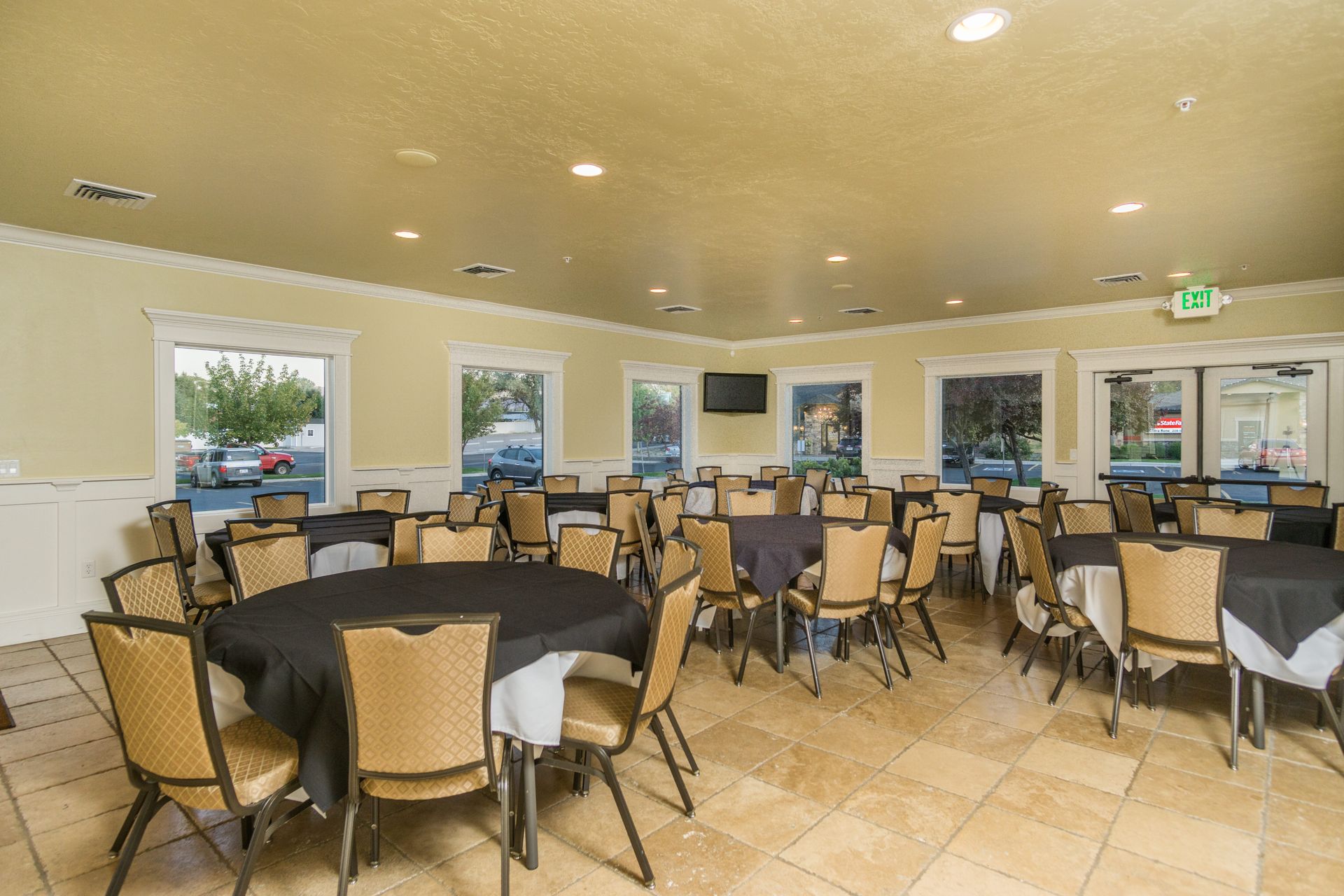 A large dining room filled with tables and chairs.
