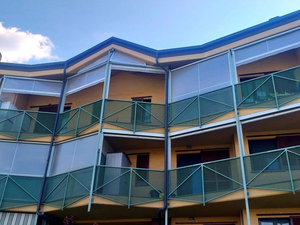 tende veranda per edifici residenziali