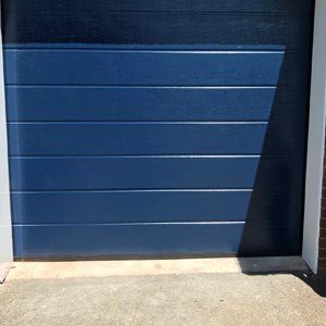 Insulated sectional door designs