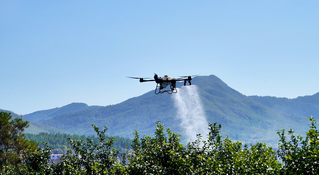 A drone is flying over a road.