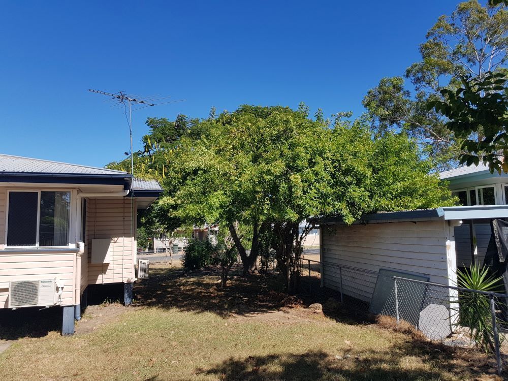 A House With A Lot Of Trees In Front Of It — Brown's Vegetation Management In Mulara, QLD