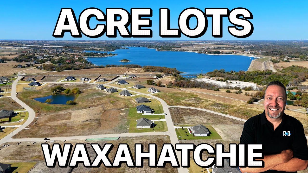 Aerial view of Waxahachie acre lots, with a man smiling in the foreground. Houses and a lake are visible.