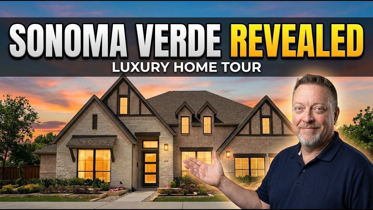 A man gesturing toward a brick luxury home at sunset, with the text