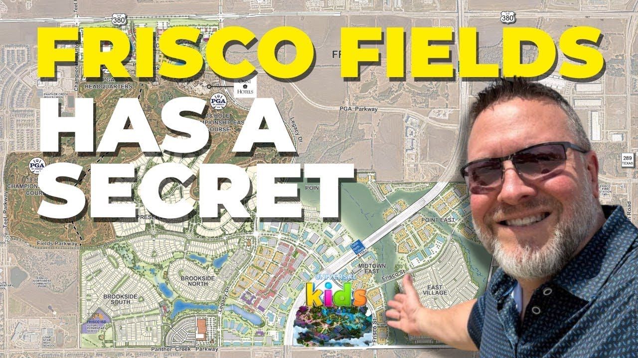 A man is pointing at a map of frisco fields.