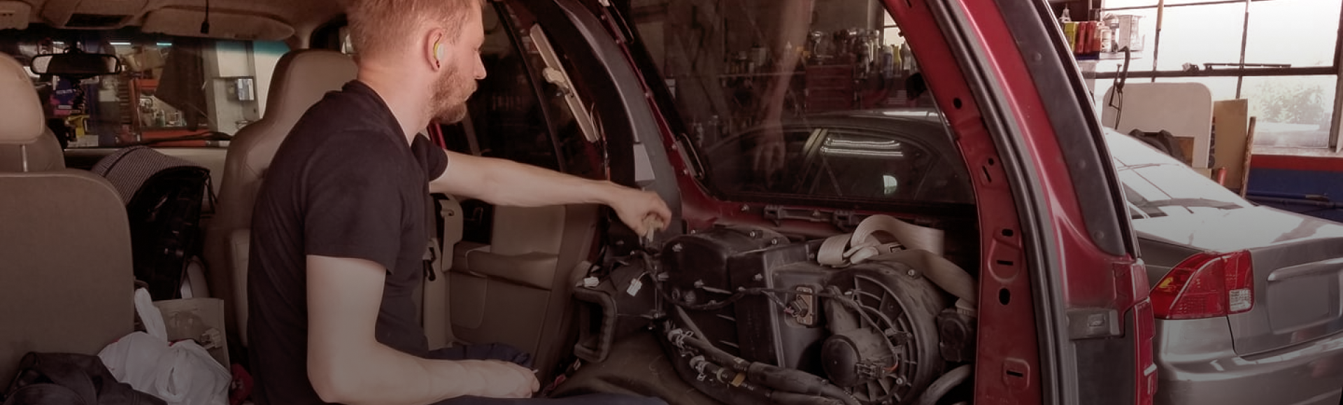 Technician working on vehicle | Foltz Automotive