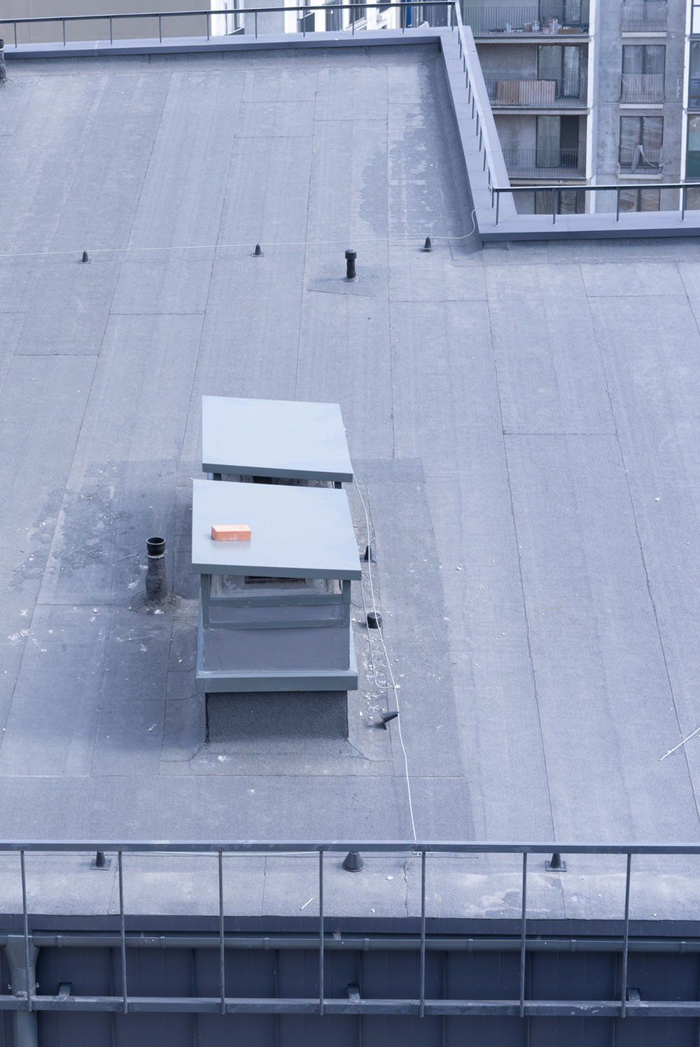 Rooftop of a Tall Building — Newport News, VA — Peninsula Roofing Company Inc.