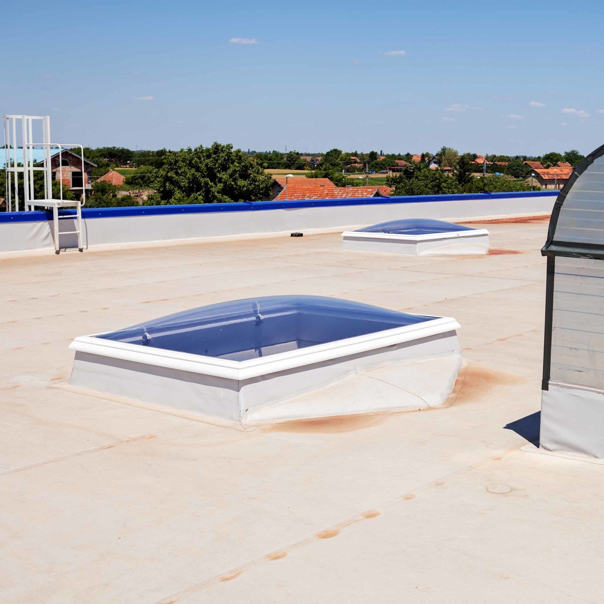 Flat Rooftop of a Building — Newport News, VA — Peninsula Roofing Company Inc.
