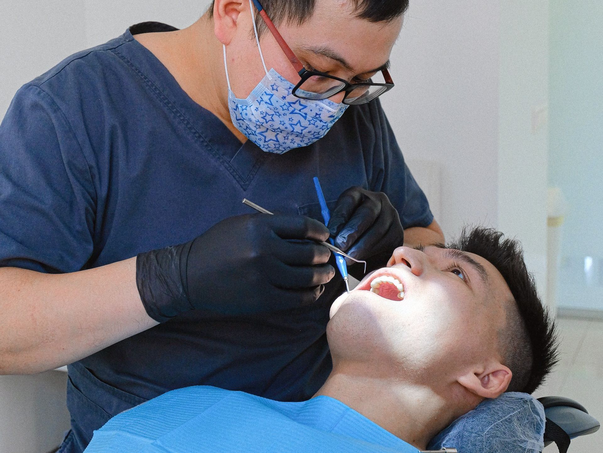 Dental team performing implant surgery