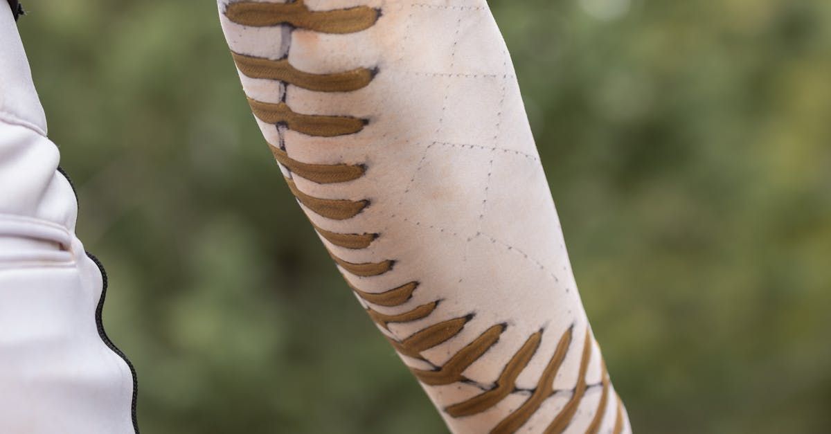 A close up of a person 's arm with a compression garment on it.