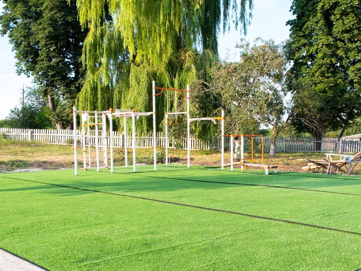 playground with artificial grass flooring