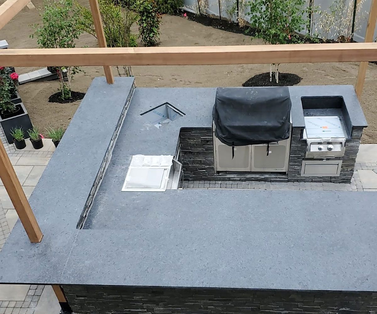 Copley Ohio backyard kitchen with steel gray granite outdoor countertop