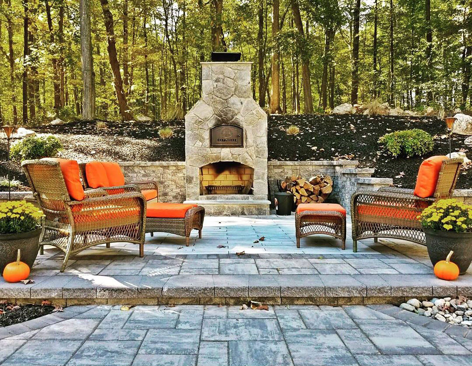 Round Grove outdoor stone fireplace all in one kit on Ohio paver patio
