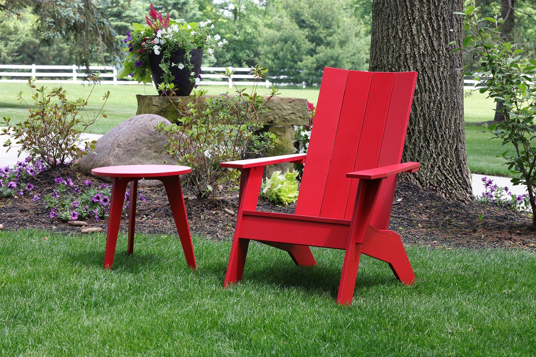 Berlin Gardens nordic style adirondak chair made from marine grade poly lumber in Ohio backyard