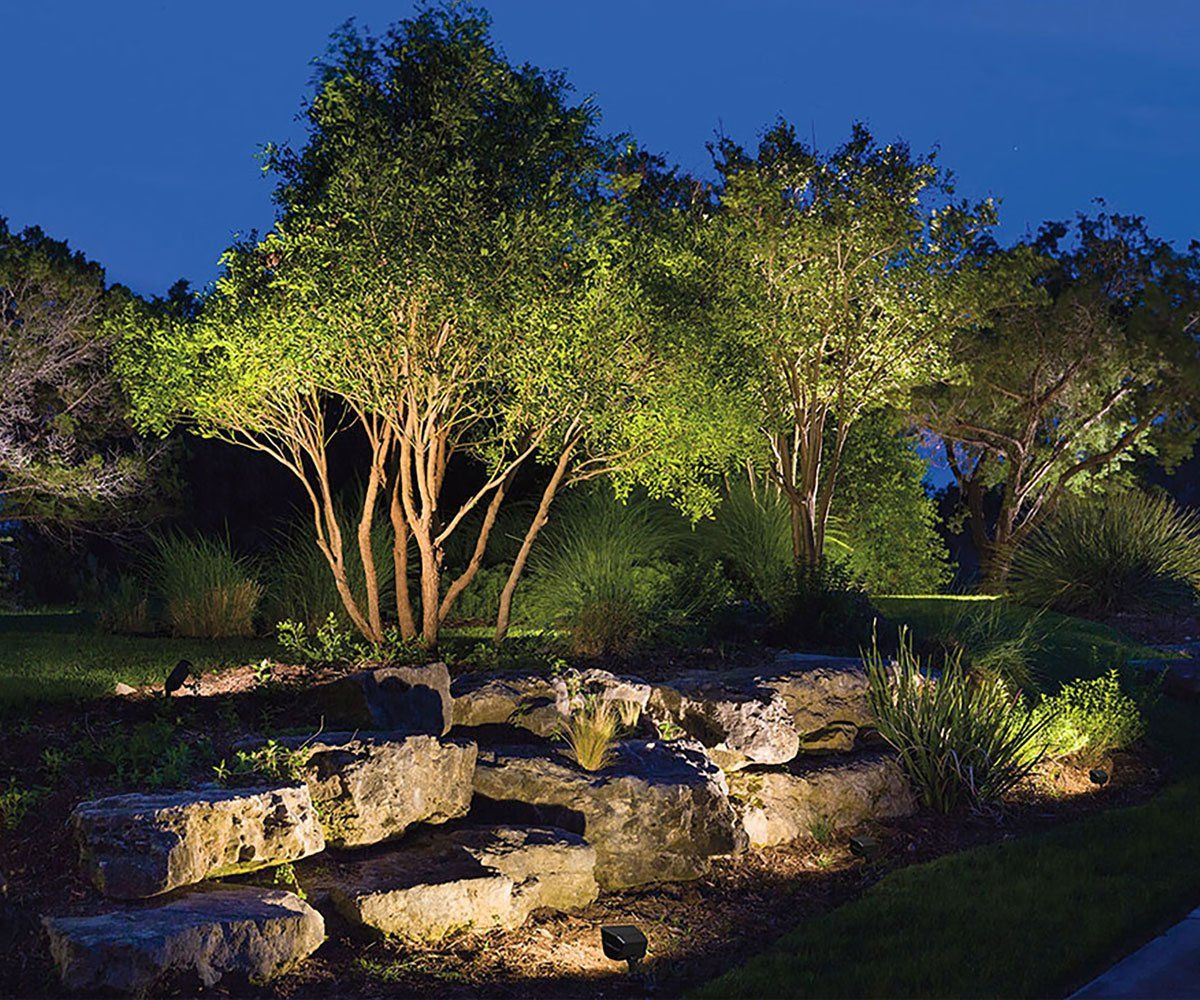 Ohio backyard with trees and uplighting and landscape stone accent spot lights