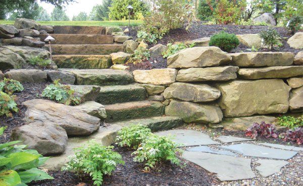 Natural landscape stone barnstone steps and wall
