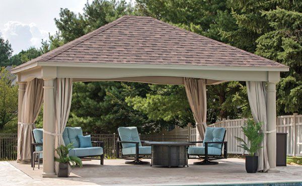 Beautiful amish crafted outdoor pavilion and pergola with curtains by Ohio pool.
