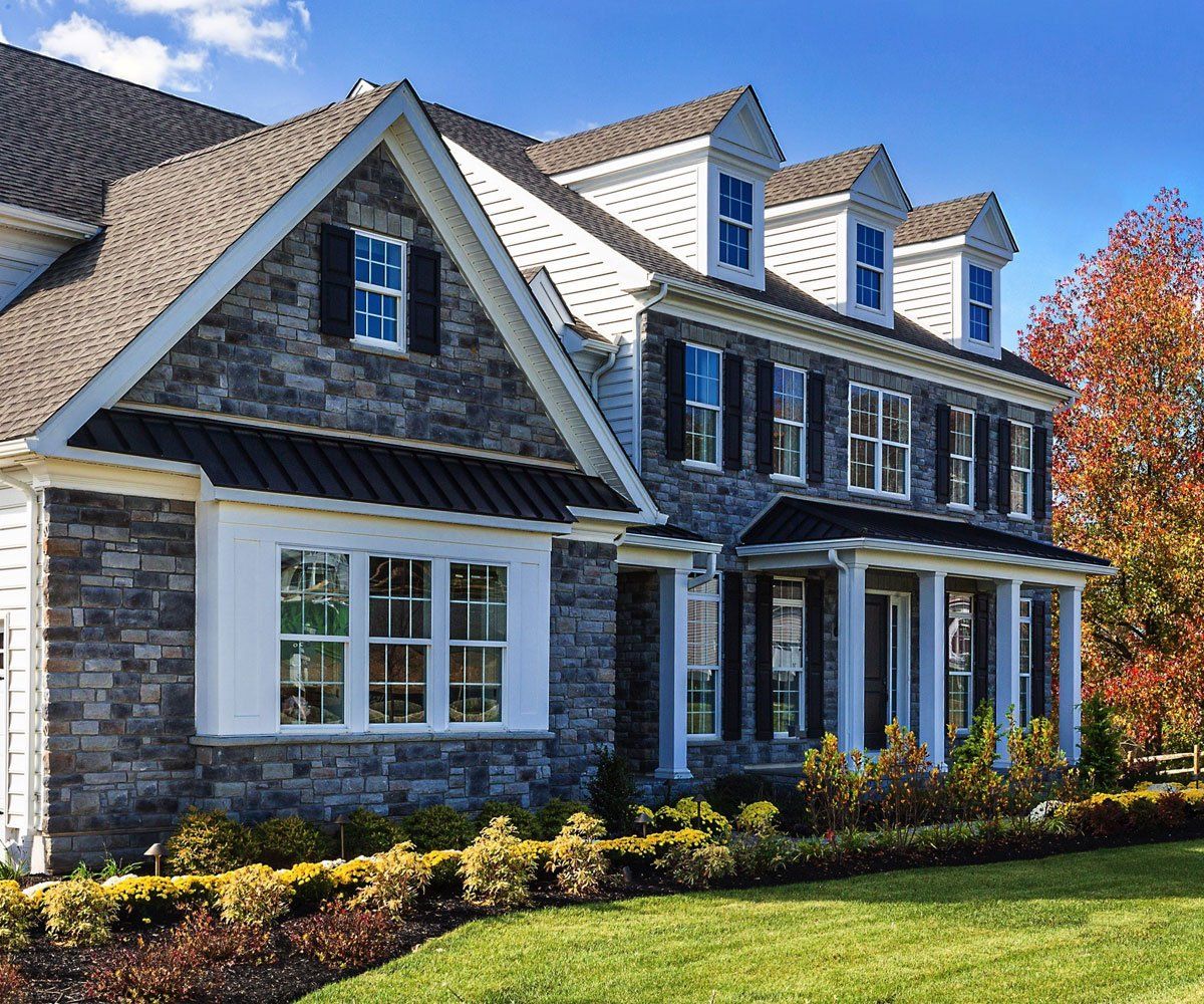 Chagrin Falls Ohio home with manufactured stone veneer exterior