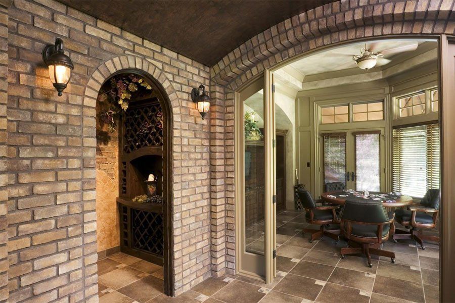 Eldorado Stone Riverbed Thin Brick Veneer Interior Wall Arch and Wine Cellar