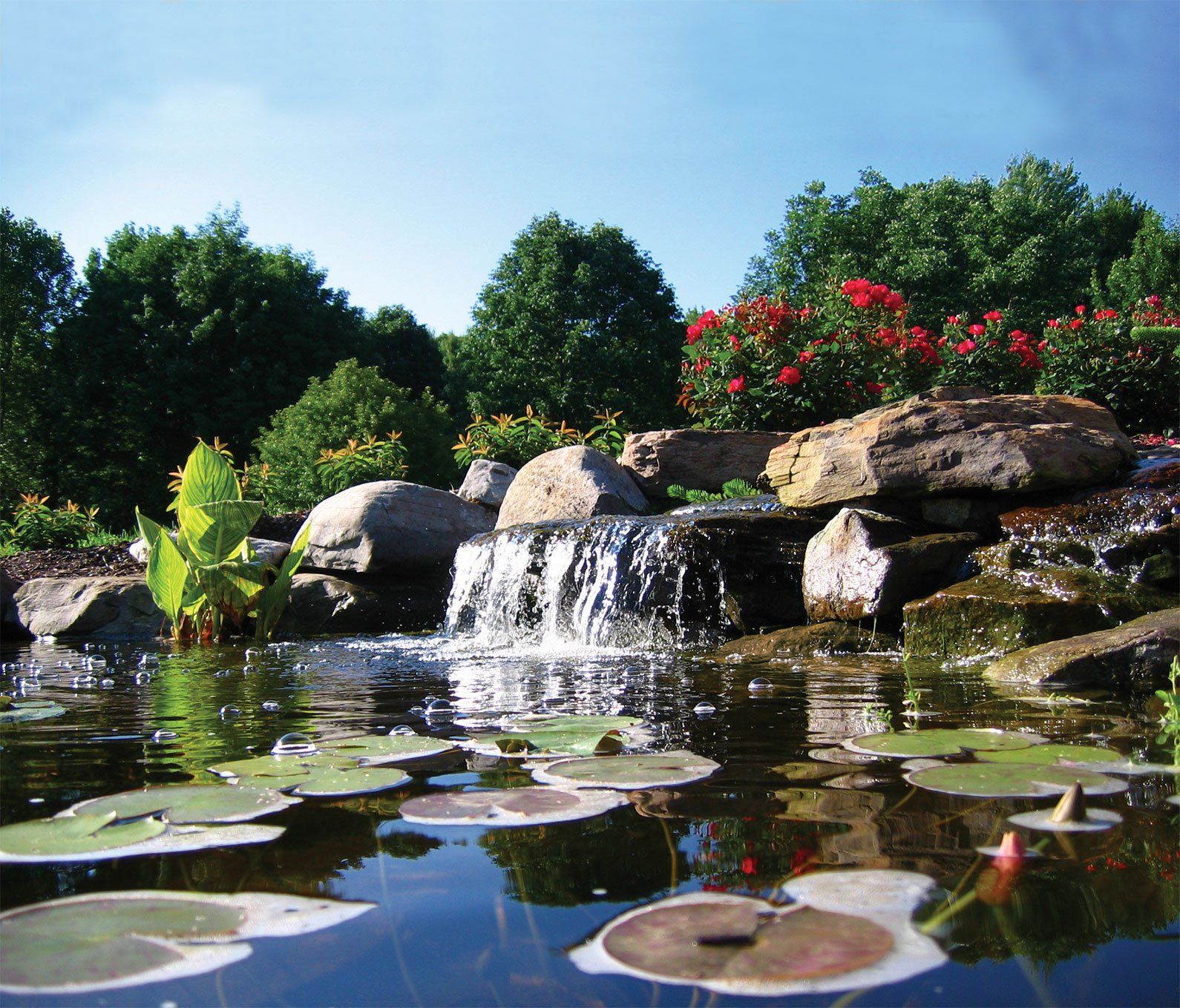 Natural stone waterfall in Ohio pond system