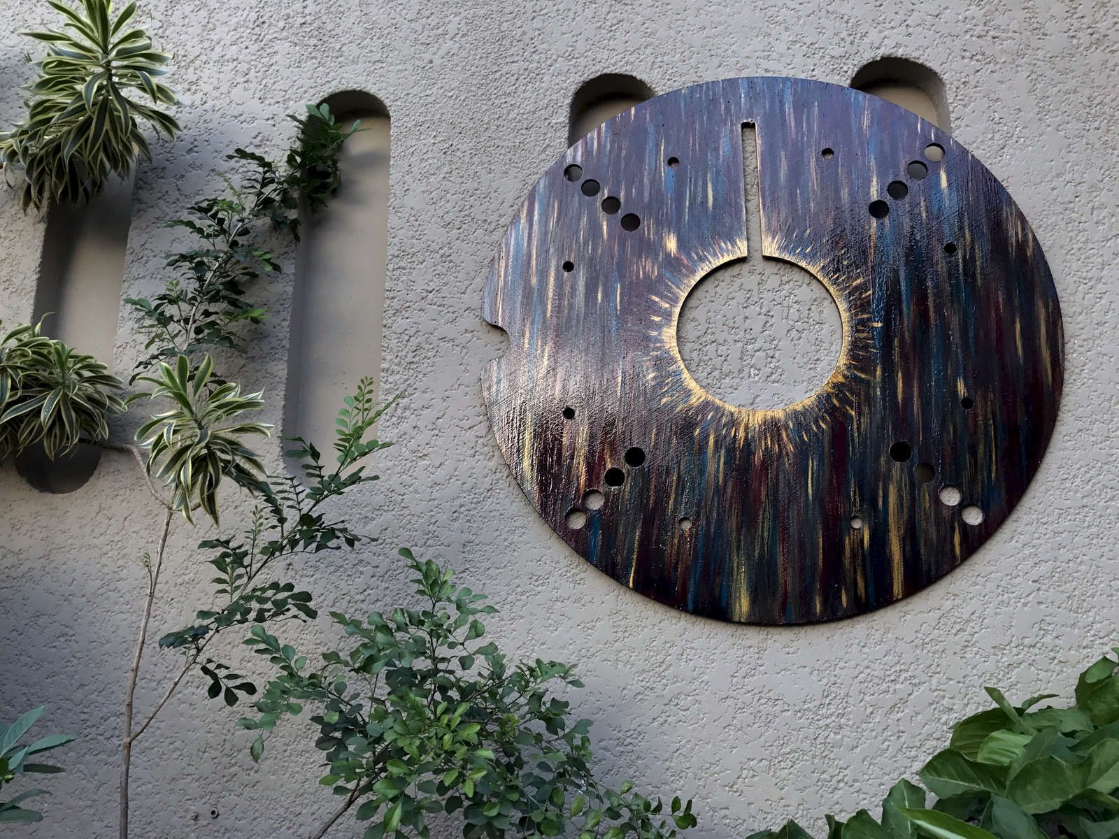 Monique Stauder's metamorphic art painting, Refracted Light, using
Acrylics, car paint, mirror pieces on Glastherm disk