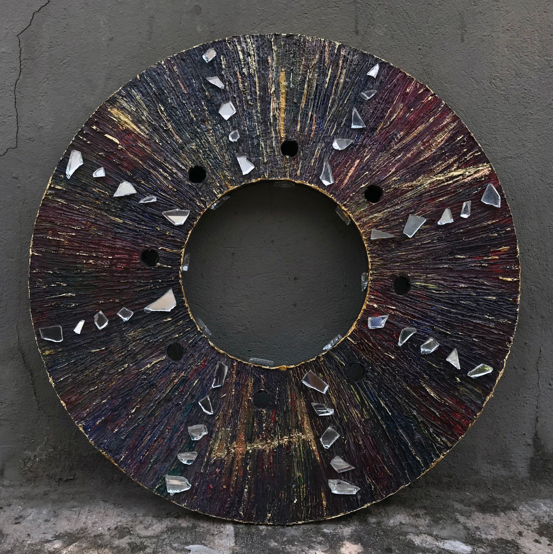 Monique Stauder's metamorphic art painting, Refracted Light, using
Acrylics, car paint, mirror pieces on Glastherm disk