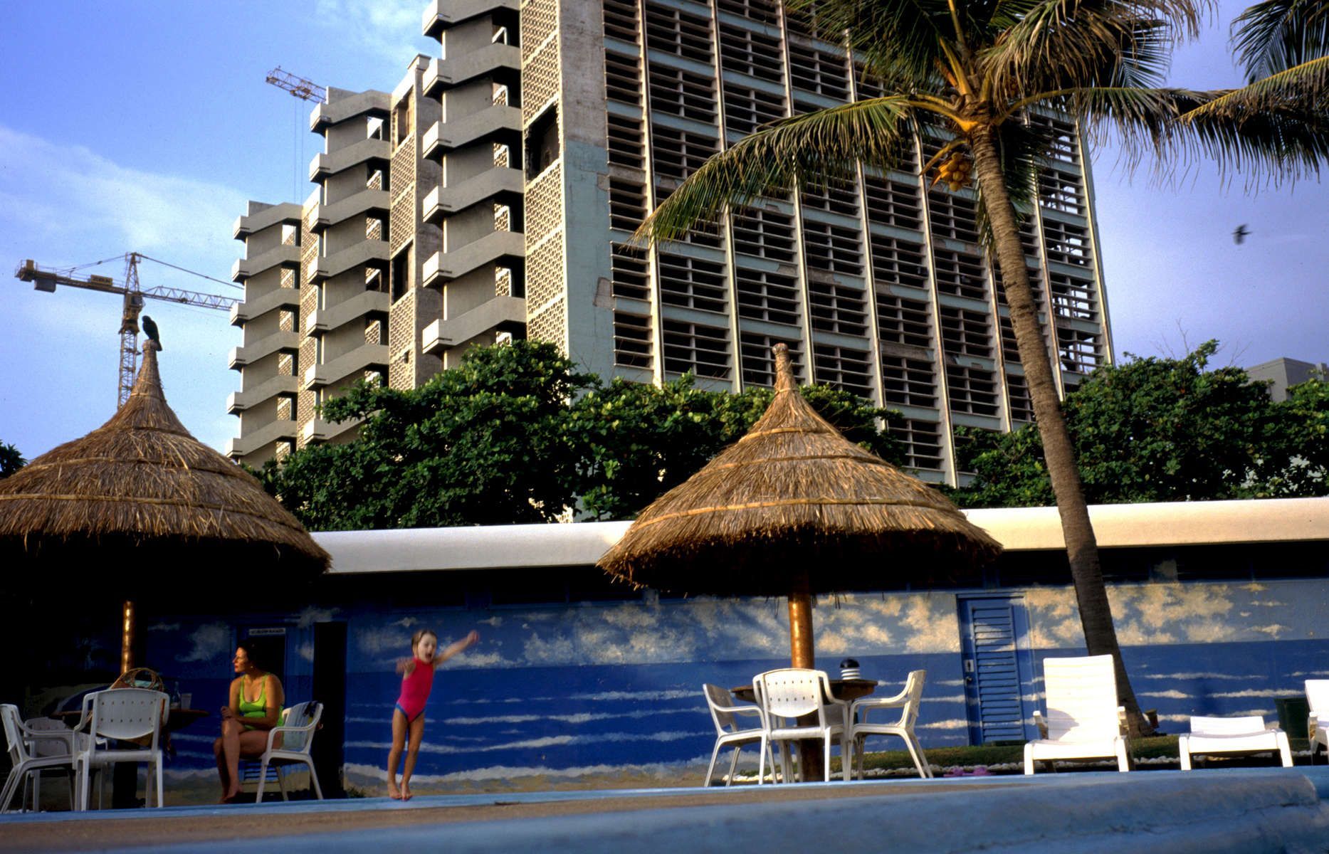 Stauder's editorial image of expats in a hotel in Colombo, Sri Lanka while the ethnic war raged in the northeast 1997