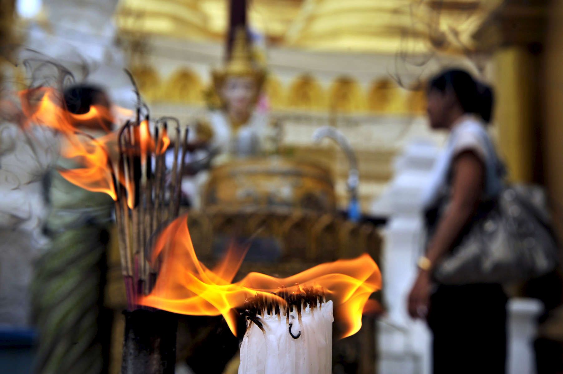 Stauder's editorial image of Schwedagon Pagoda burnt offerings in Yangon Myanmar 2010