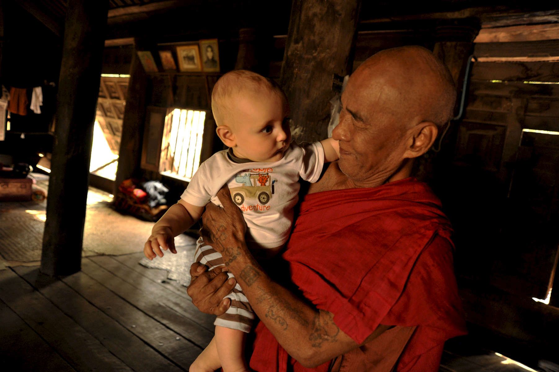 Monique Stauder portrait of her son, Konrad, with a Burmese Monk in Mandalay Myanmar 2010