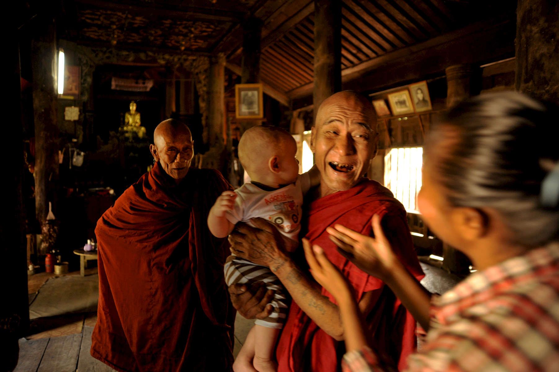Burmese monk and Monique Stauder's son, Konrad in Mandalay, Myanmar 2010 
