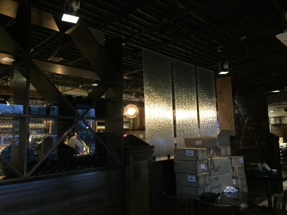 A dark room with a lot of boxes on the floor