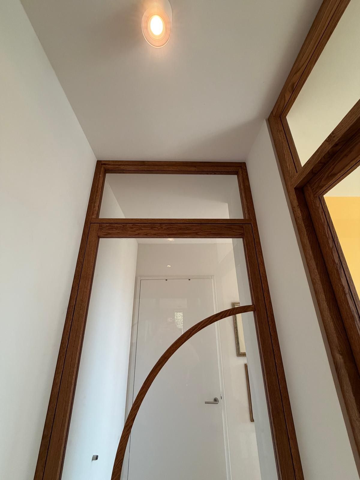 Eiken binnendeuren met bovenlicht in bestaand kozijn op maat gemaakt.