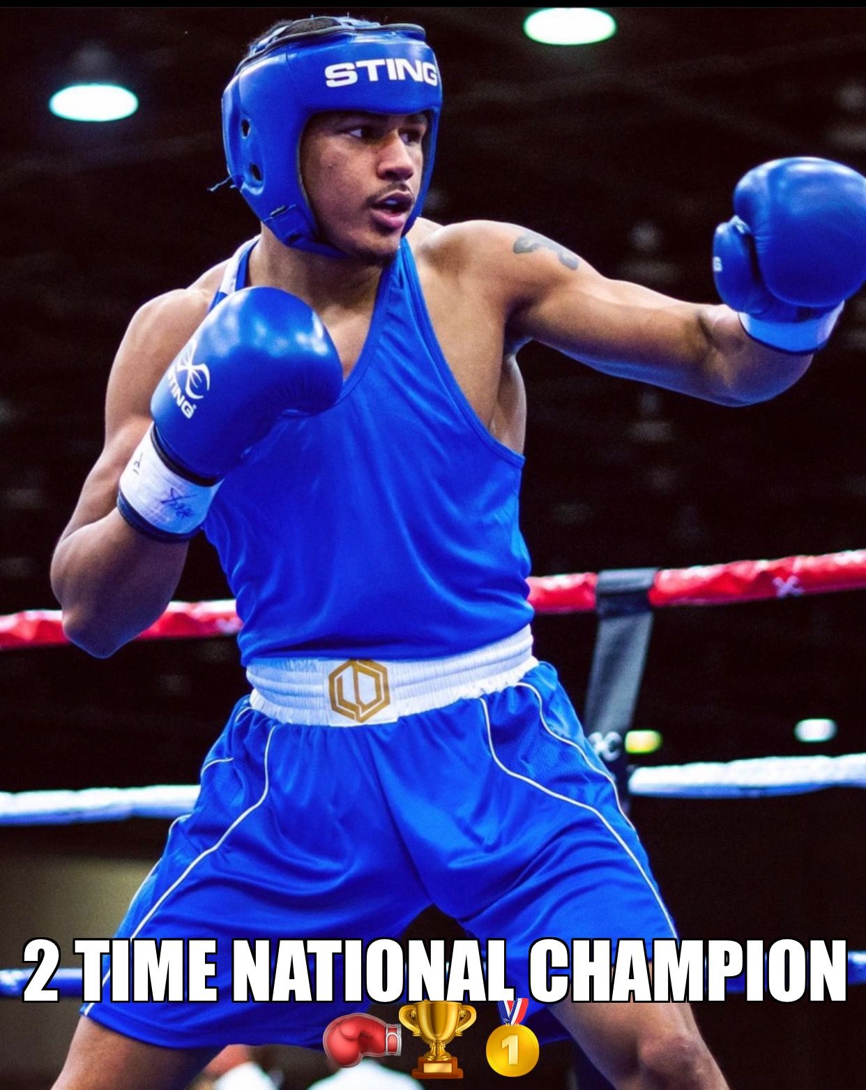 A boxer wearing a sting helmet is a 2 time national champion