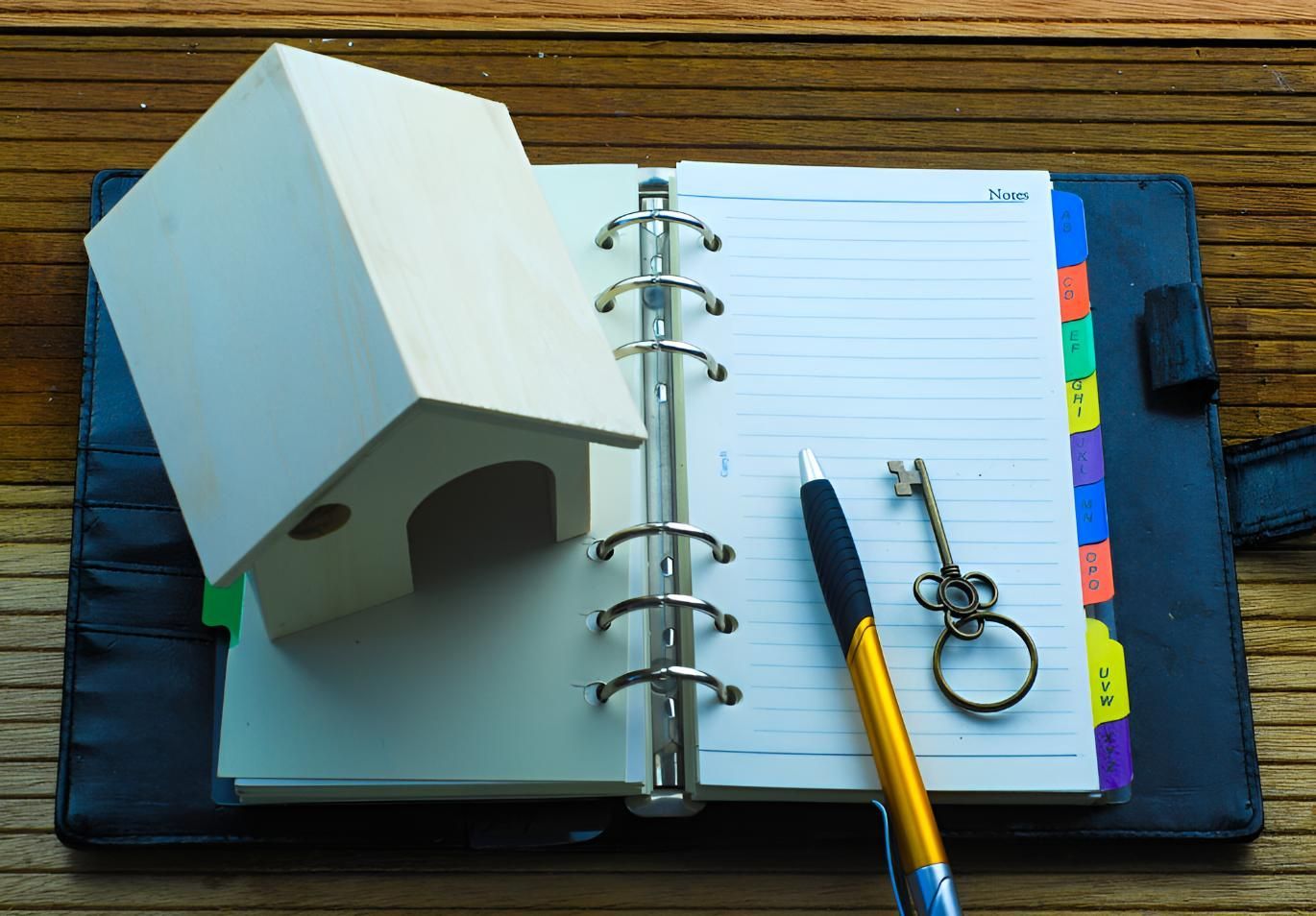 A Notebook With a Pen, Keys and a Model House on It — Key2 Conveyancing In Forster, NSW