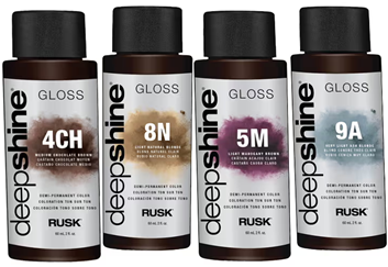 Four bottles of deepshine gloss are lined up in a row