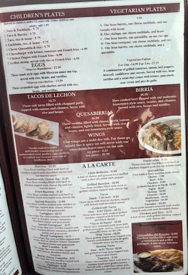 Menu featuring children's plates, vegetarian plates, tacos, quesadillas, wings, and à la carte options.