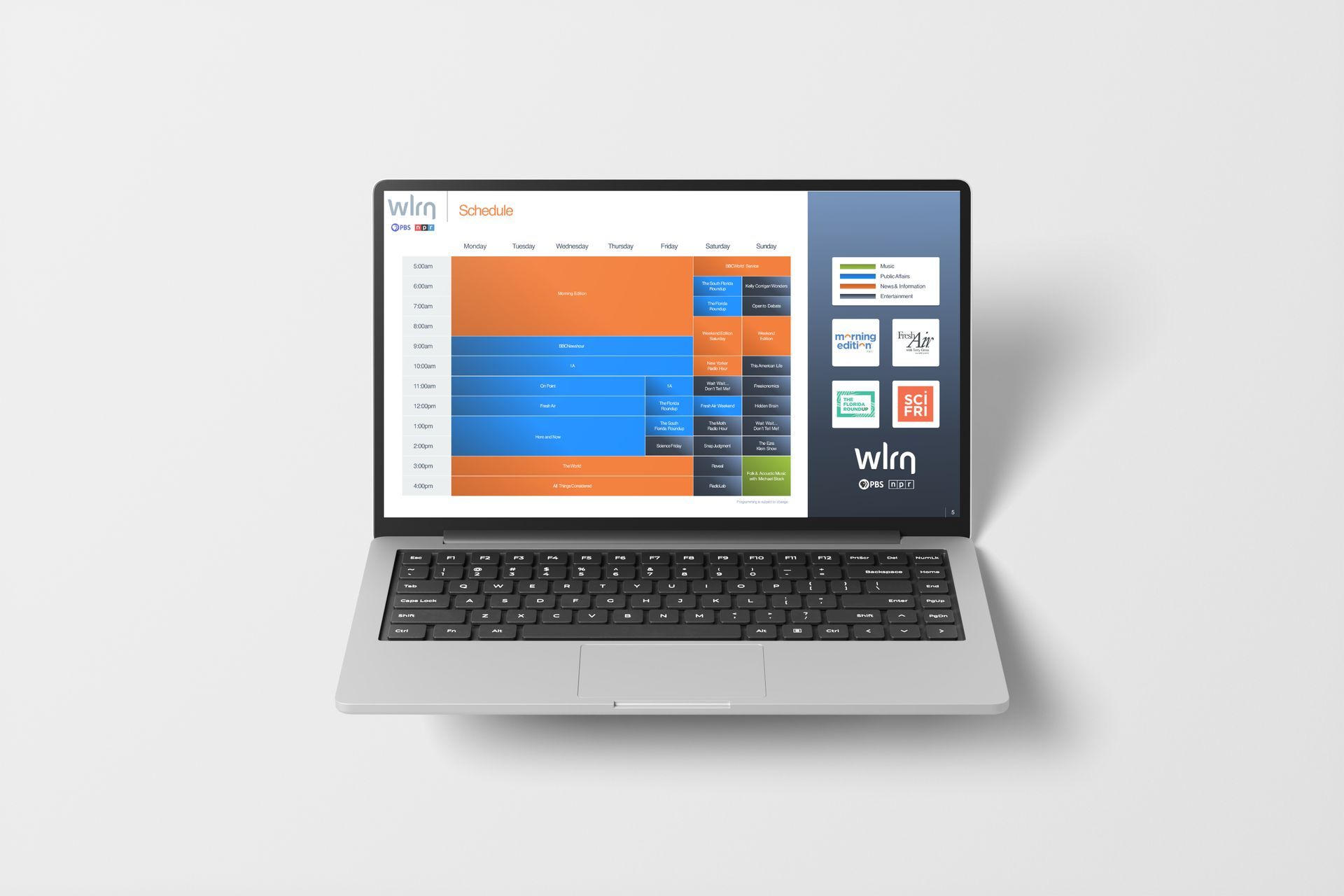 Laptop displaying a data visualization in orange, blue, and black, against a white background.