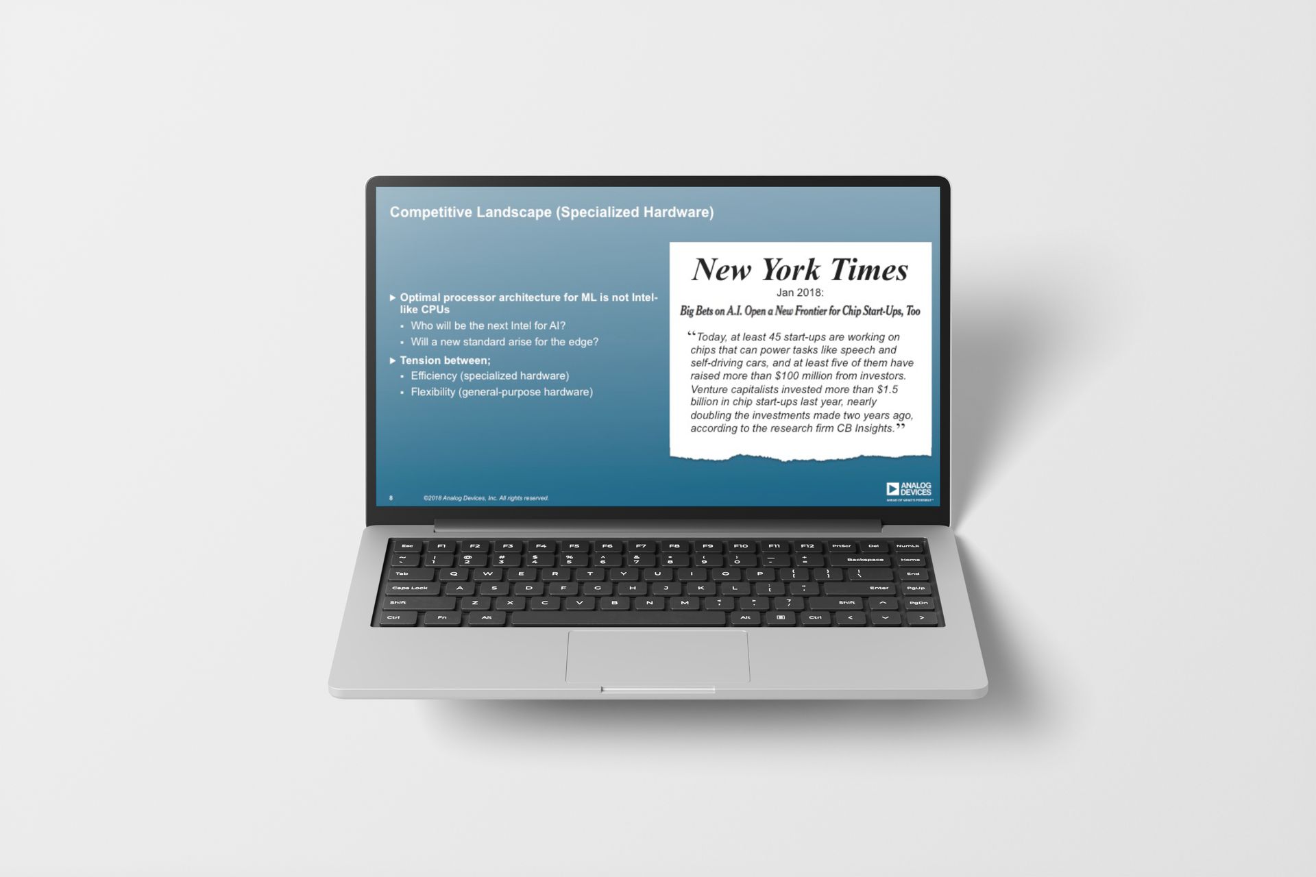 Laptop displaying a New York Times article with a blue and white presentation on the side.