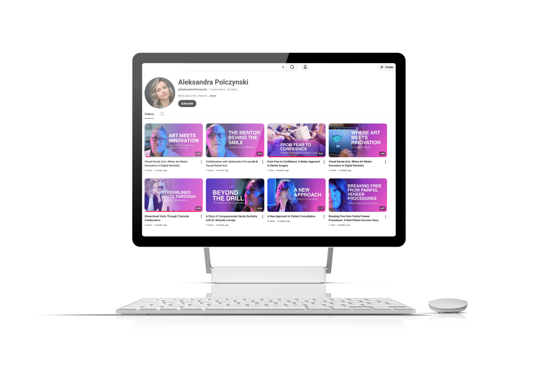 Computer displaying a YouTube channel page with videos. Mostly purple and blue thumbnails.