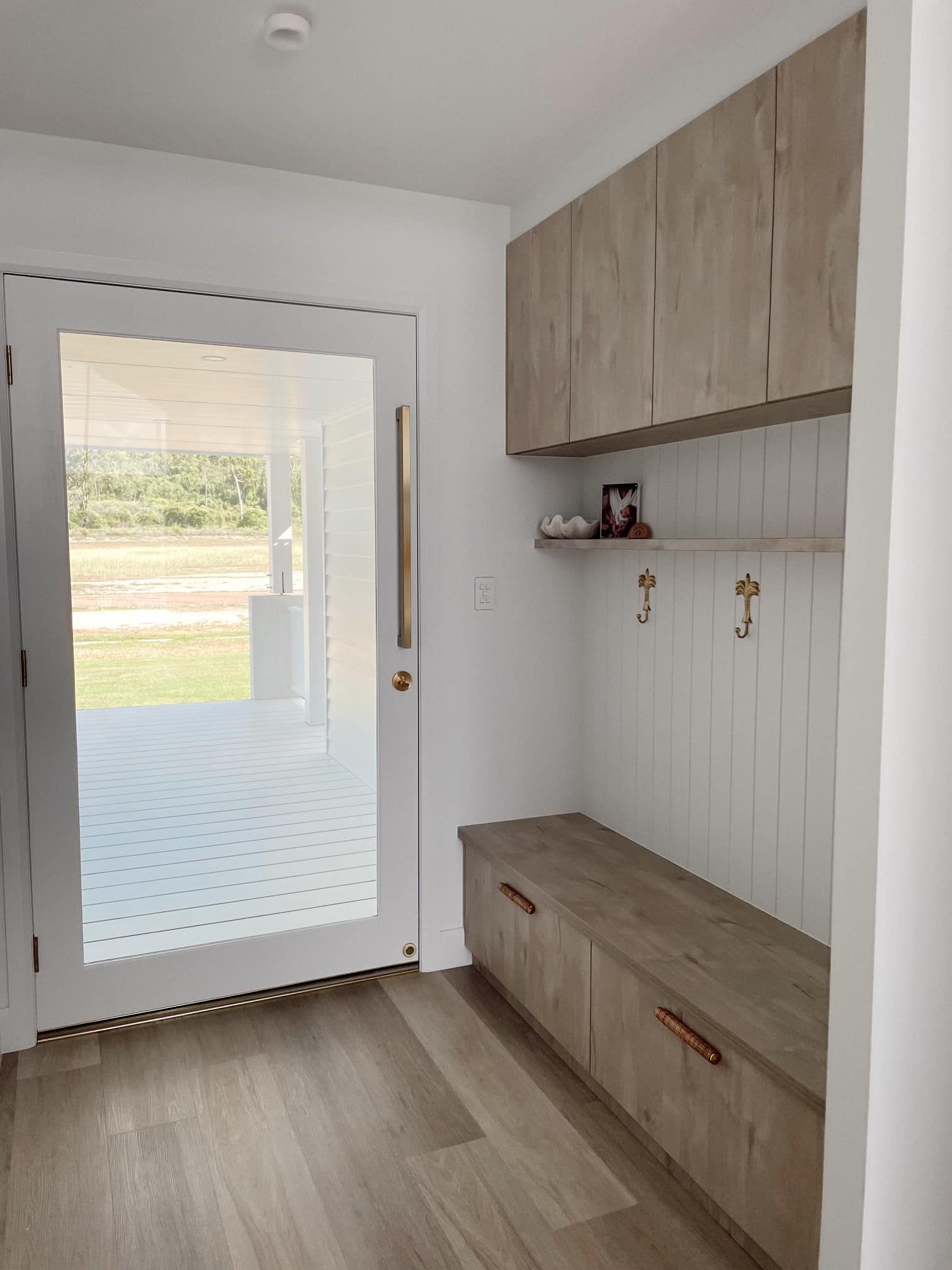 Cabinet Near Door Going Outside— Simon Bell Constructions in Alice River, QLD