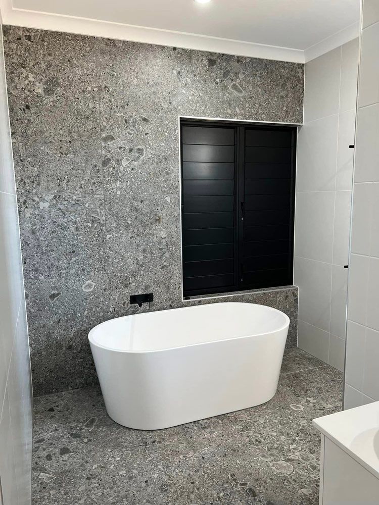 Bathroom White Tub — Simon Bell Constructions in Alice River, QLD