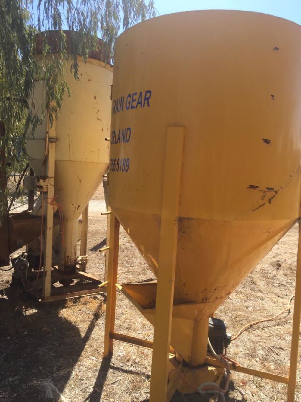 A Yellow Silo With the Word Gear on It — Wallamore Grading & Packaging In Barraba, NSW