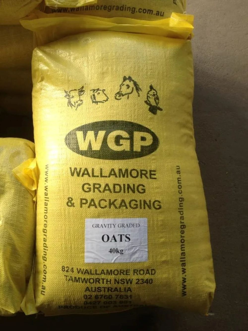 A Yellow Bag of Wallamore Grading and Packaging Oats — Wallamore Grading & Packaging In Wallamore, NSW