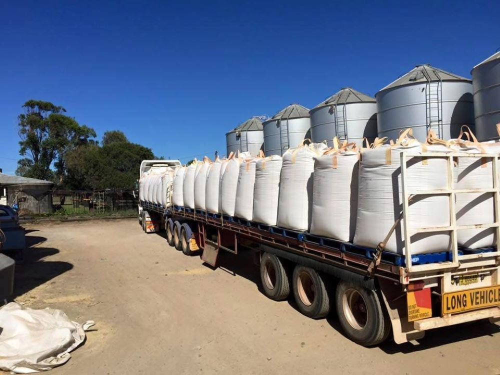 A Truck With a Lot of Bags on the Back of It — Wallamore Grading & Packaging In Wallamore, NSW
