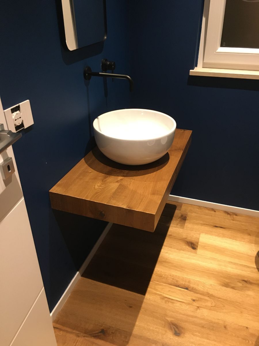 ripiano lavandino rivestito in legno