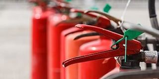 Fire extinguisher red tank in outdoor — Fire Safety equipment in Corpus Christi, TX