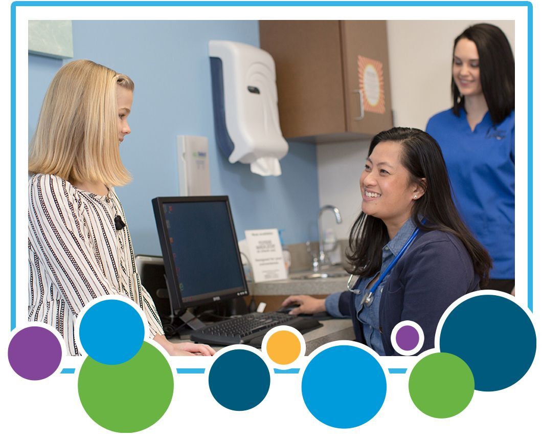 Woman talking to receptionist.