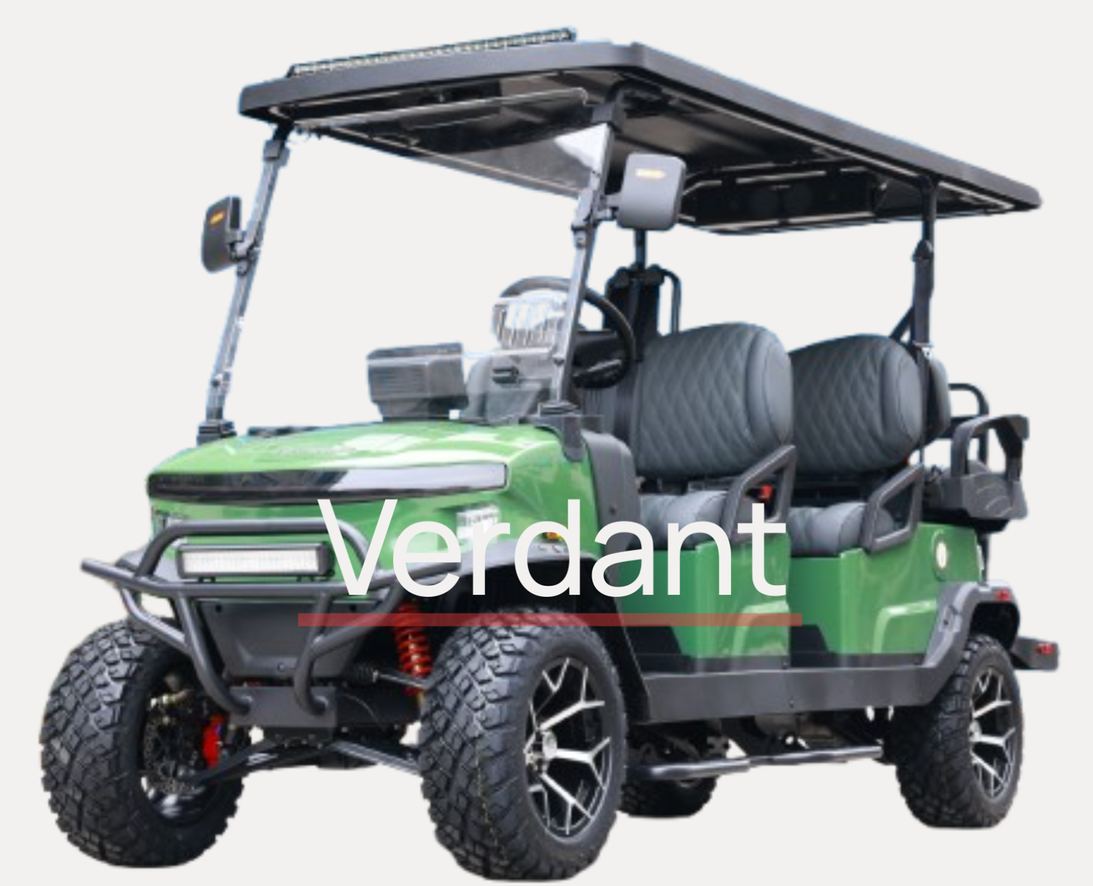 A green golf cart with a canopy is parked on the side of the road.