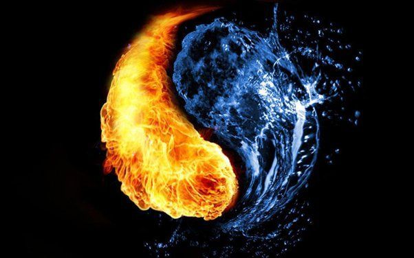 Yin-yang symbol with fire on the left and water on the right, black background.
