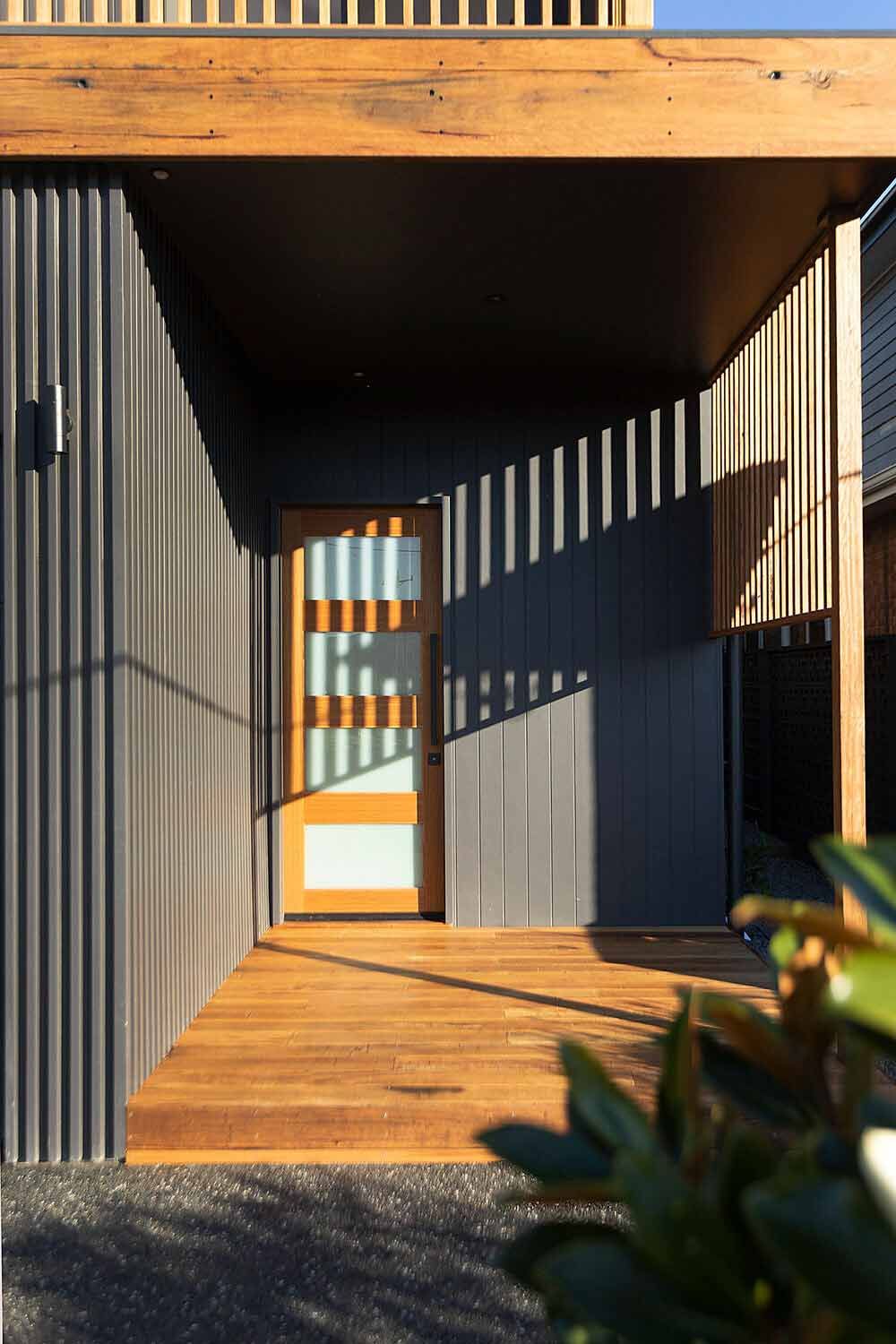 A House With a Wooden Porch and a Wooden Door — DeBu Studios In Russell Vale, NSW